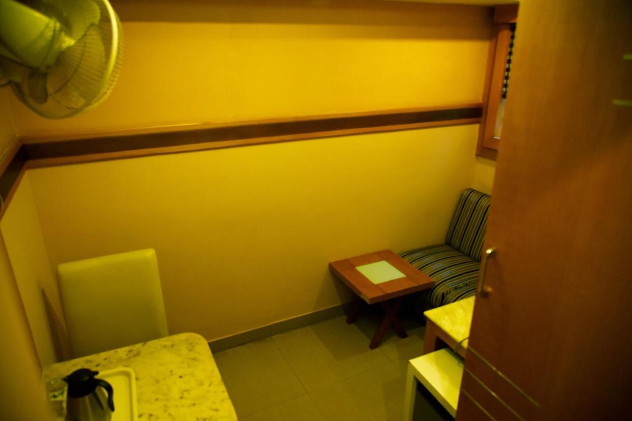 Grand Choice Hotel Bangalore Bagian luar foto