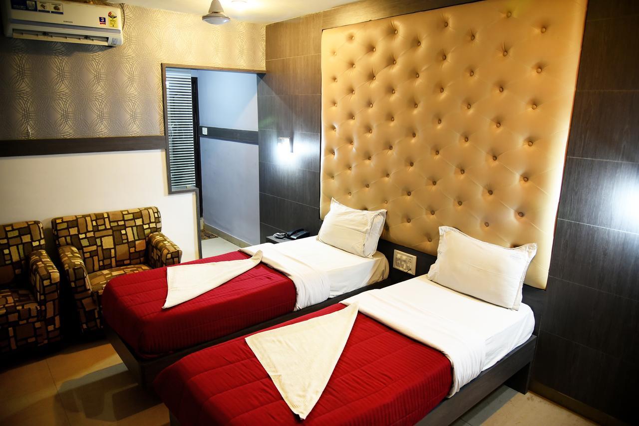 Grand Choice Hotel Bangalore Bagian luar foto