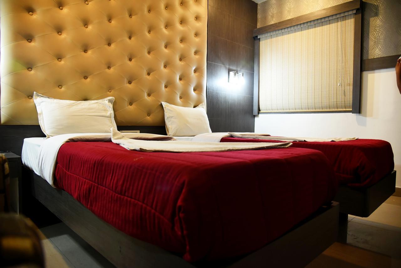Grand Choice Hotel Bangalore Bagian luar foto