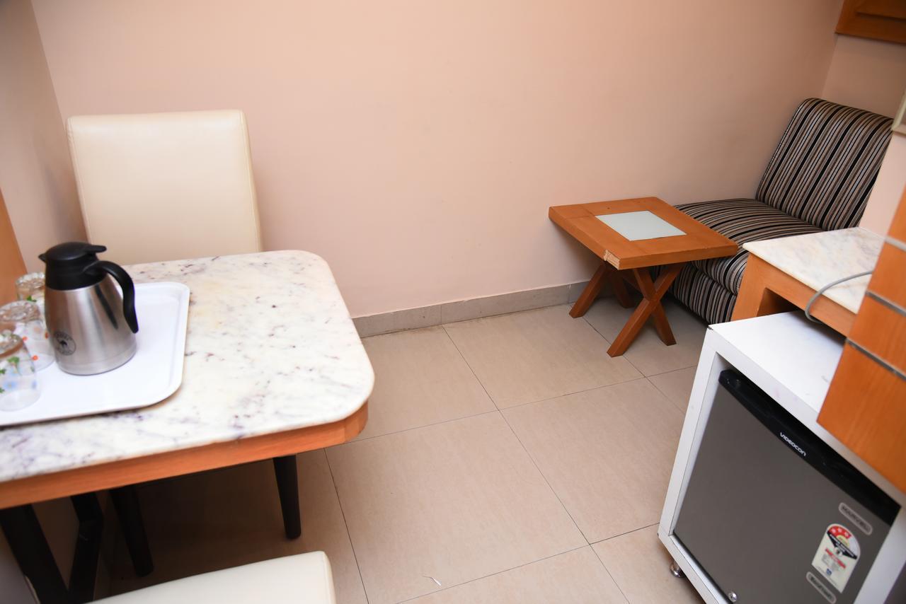Grand Choice Hotel Bangalore Bagian luar foto