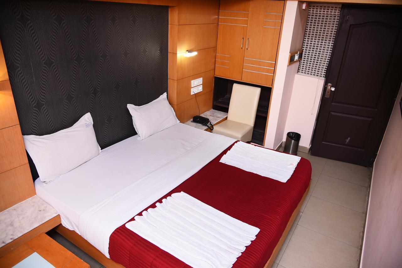 Grand Choice Hotel Bangalore Bagian luar foto