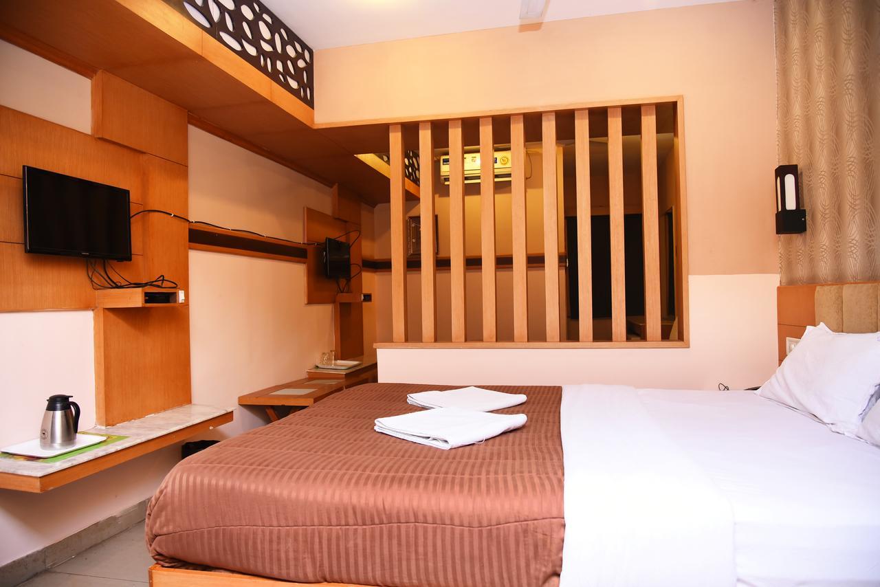 Grand Choice Hotel Bangalore Bagian luar foto