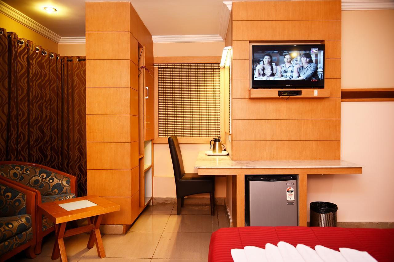 Grand Choice Hotel Bangalore Bagian luar foto