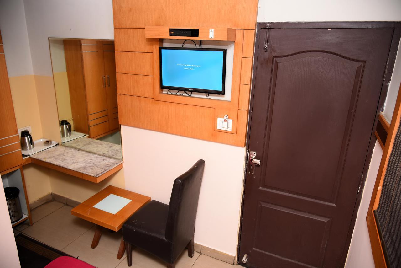 Grand Choice Hotel Bangalore Bagian luar foto