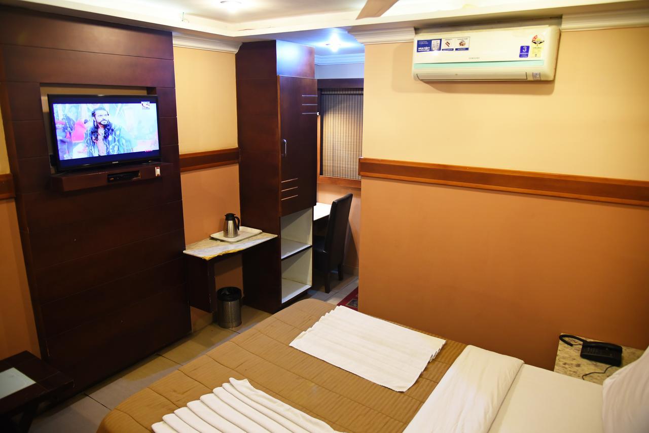Grand Choice Hotel Bangalore Bagian luar foto
